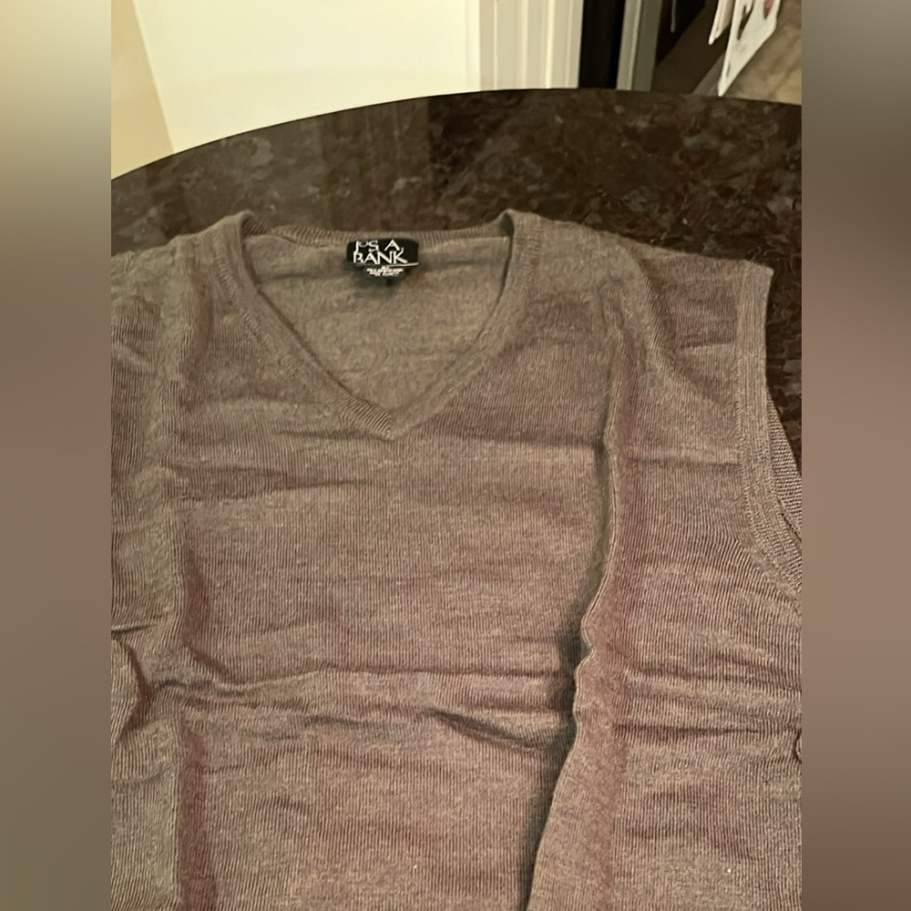 Men’s XL- 100% merino wool vest- mint condition, dry cleaned, wore twice.